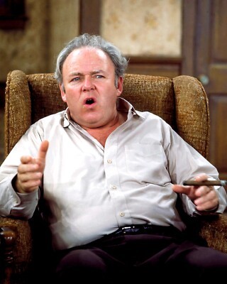 NH-Archie-Bunker-All-In-The-Family Actor Carroll O'Connor as Archie Bunker sitting in his chair from the TV show All in the Family